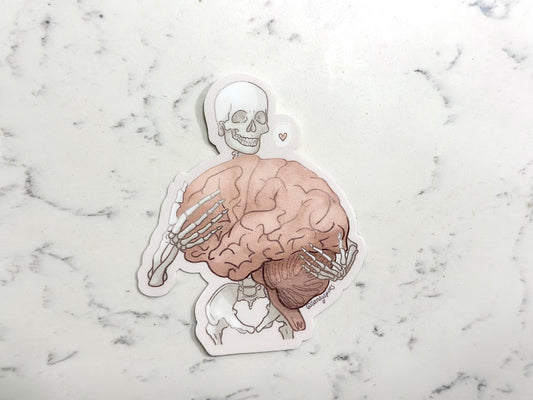 Sticker Skeleton holding brain self love